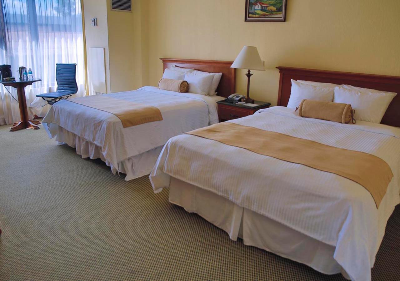 Wyndham San Jose Herradura Exterior photo A room at the hotel