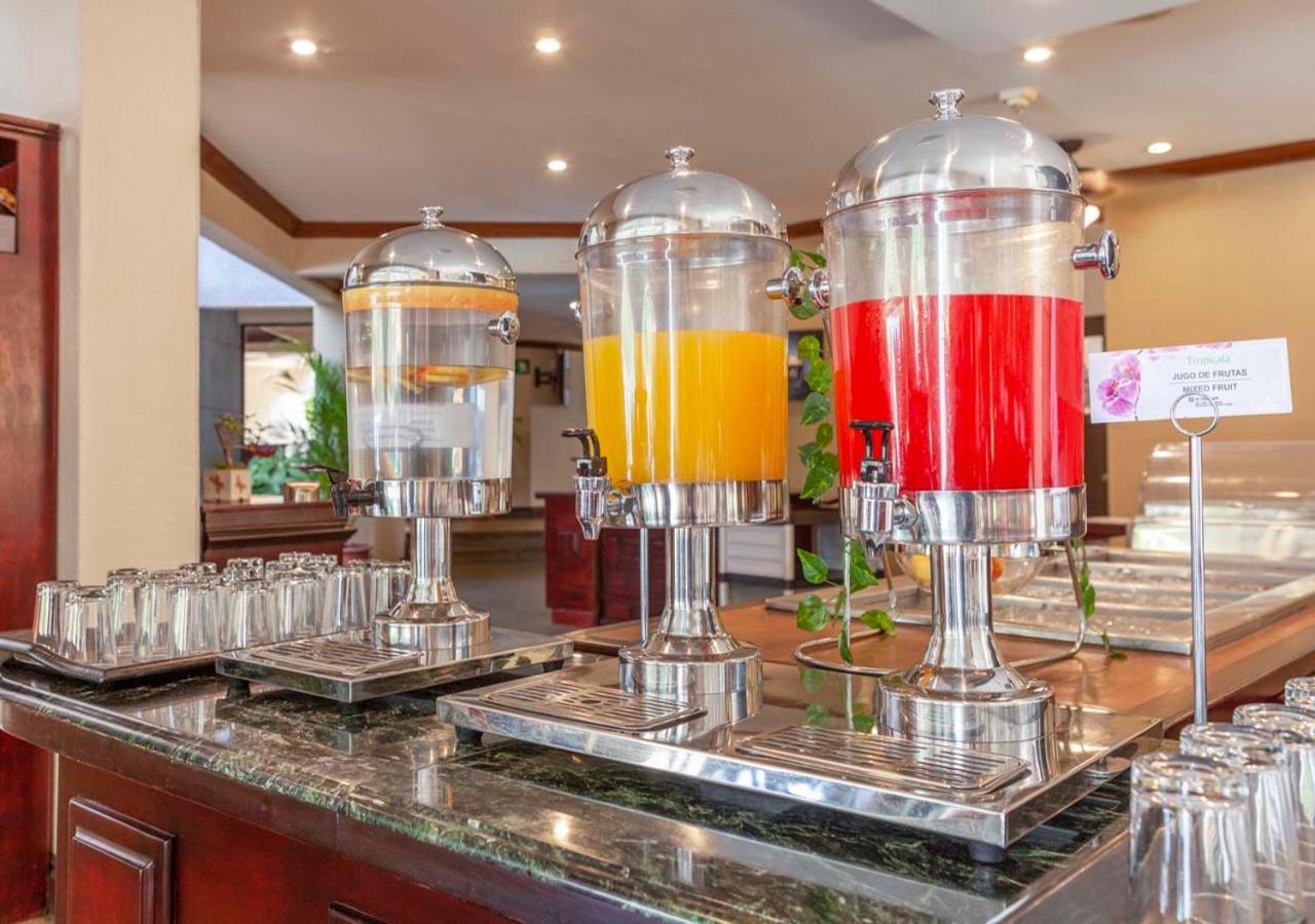 Wyndham San Jose Herradura Exterior photo Juice dispensers