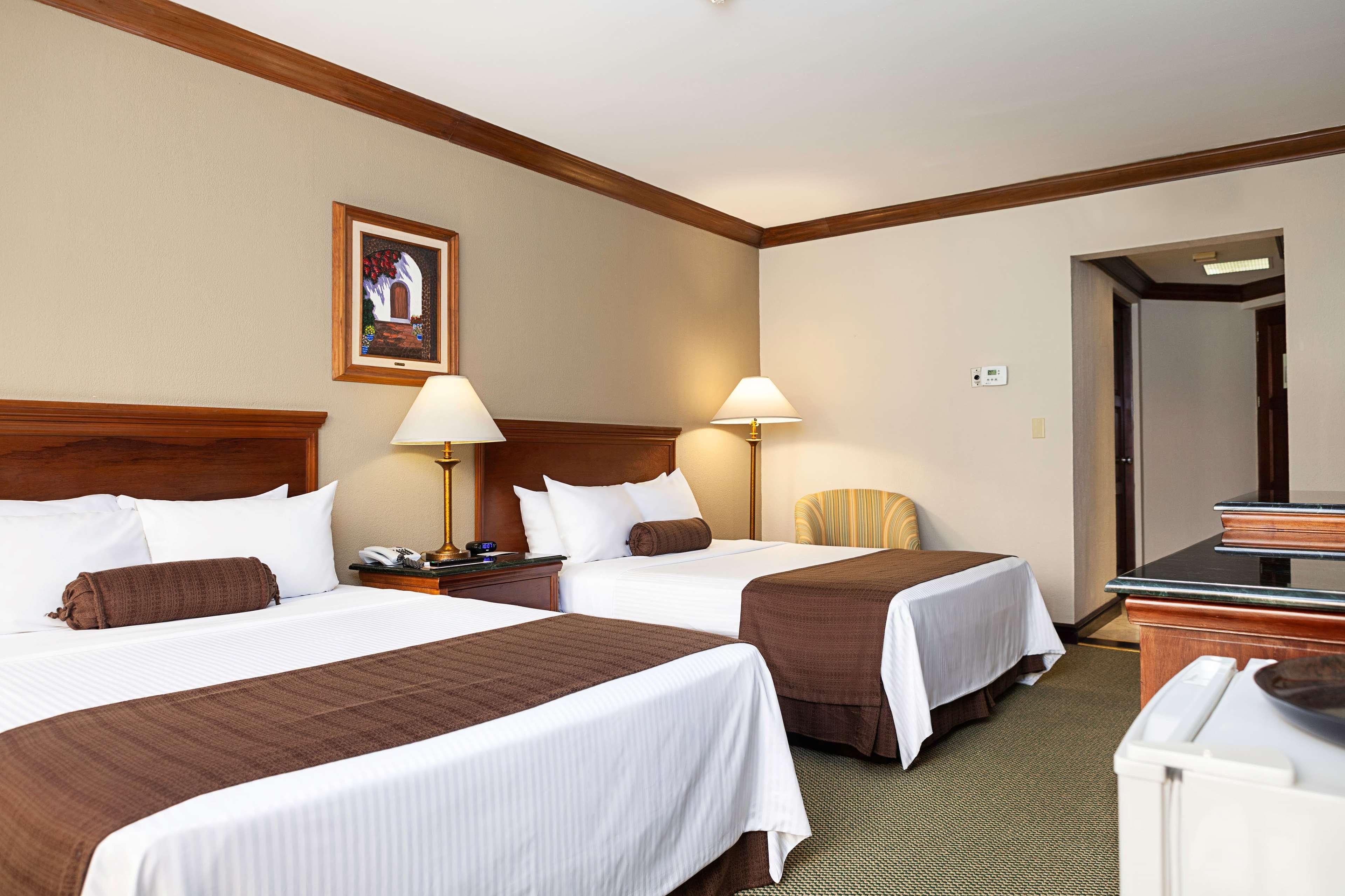 Wyndham San Jose Herradura Exterior photo A typical hotel room