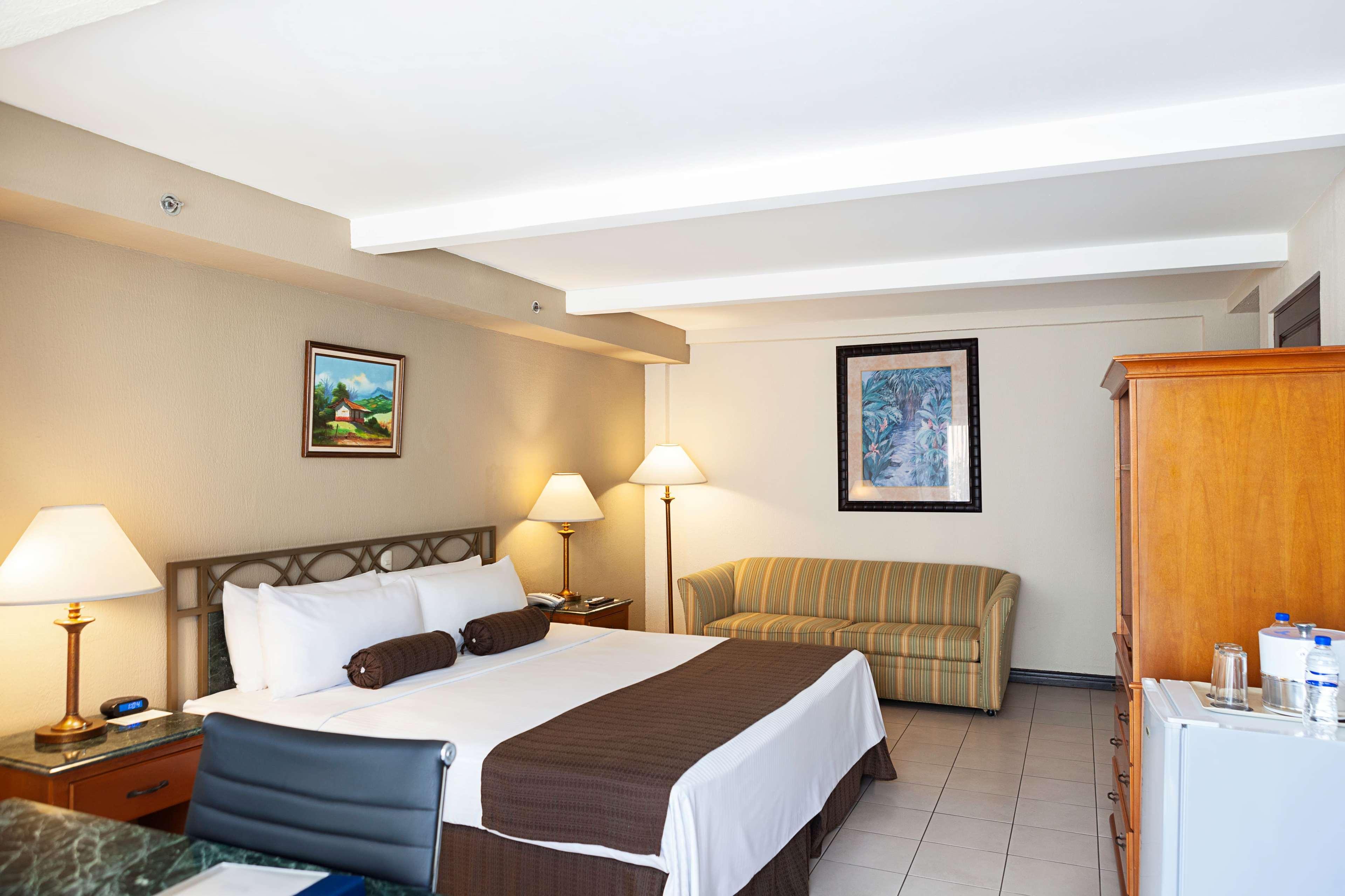 Wyndham San Jose Herradura Exterior photo A room at the hotel