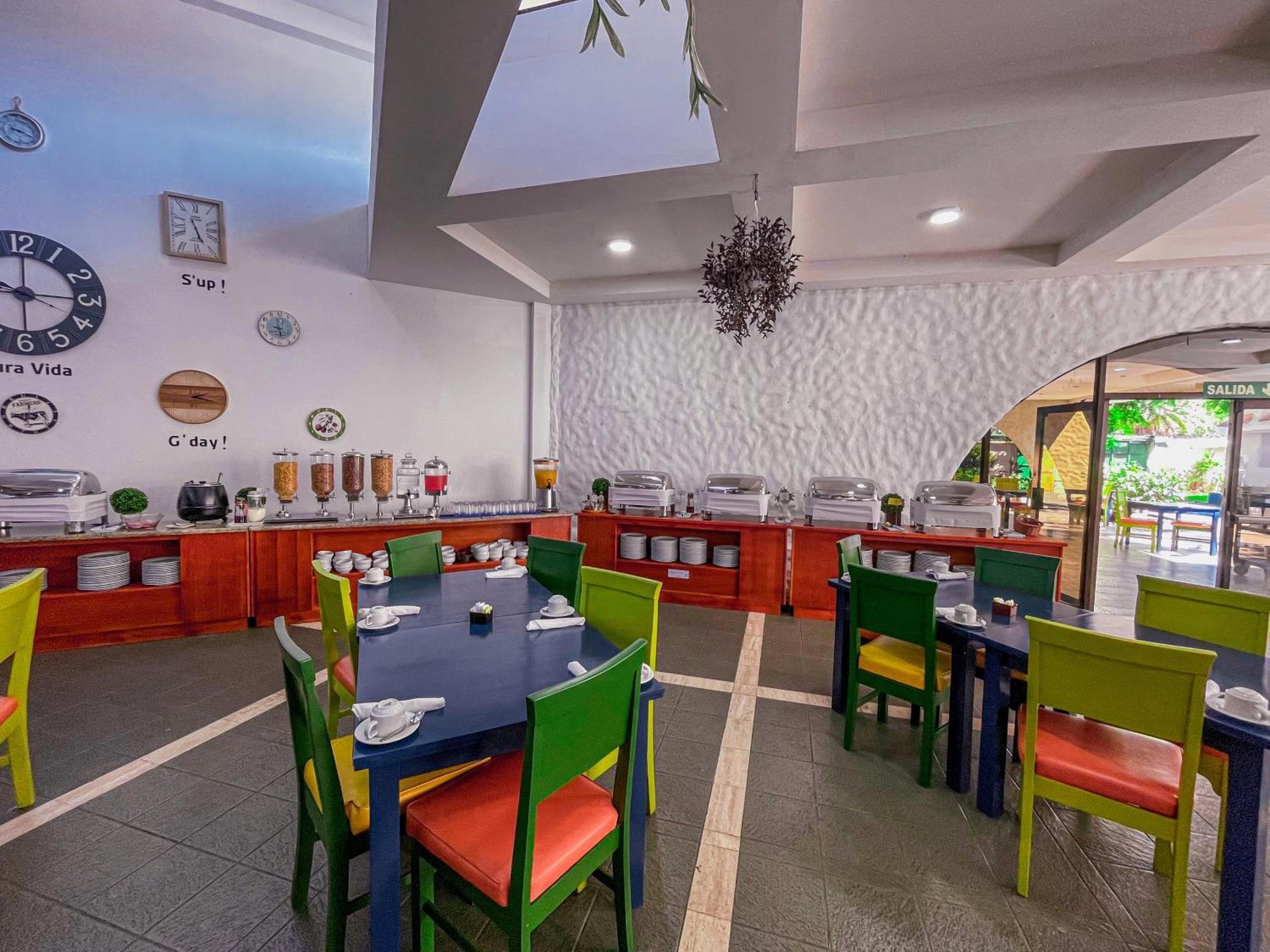 Wyndham San Jose Herradura Exterior photo The restaurant