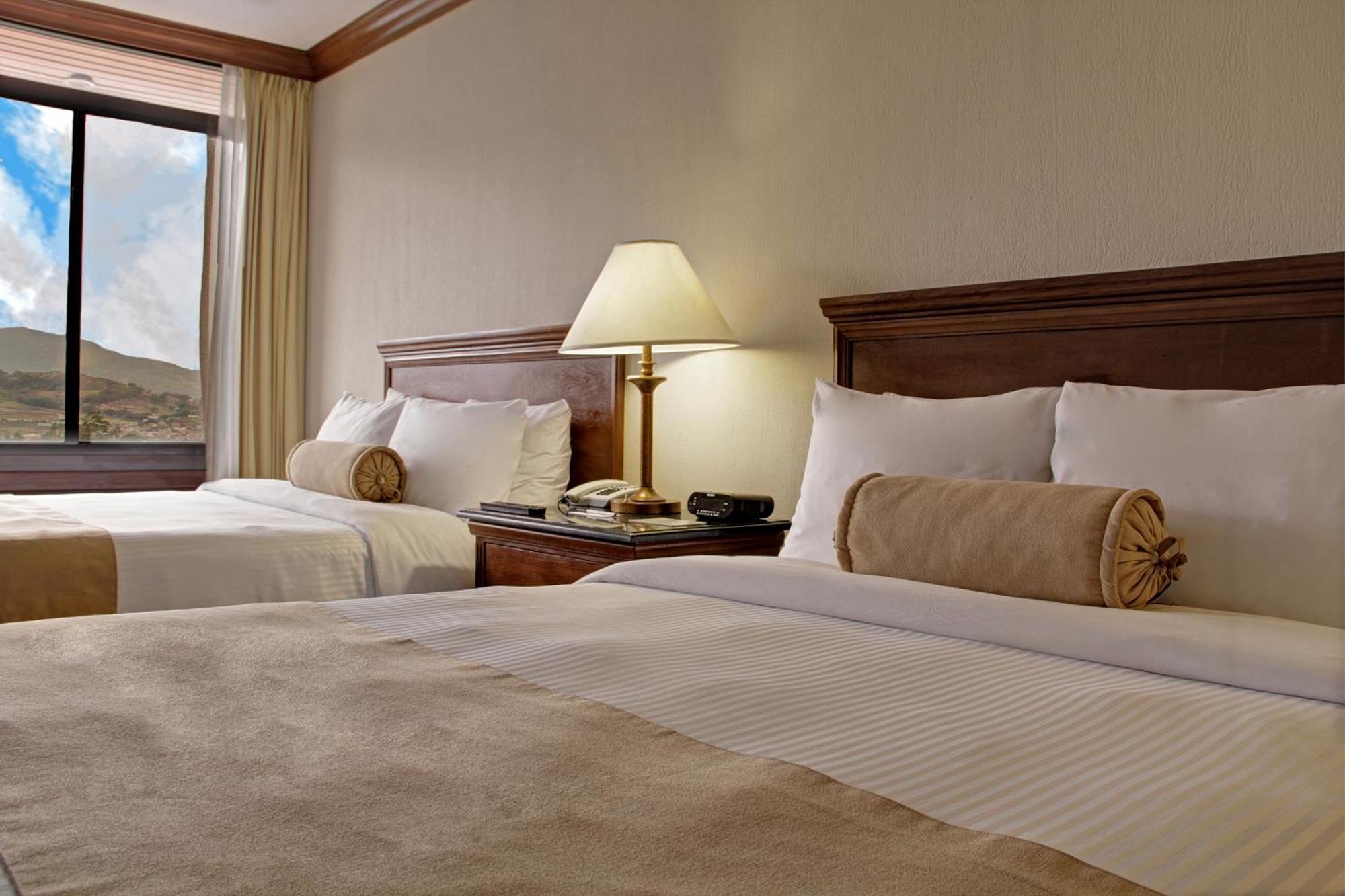 Wyndham San Jose Herradura Exterior photo A typical guest room at the Best Western Premier Collection